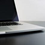 8-Considerations-Before-Buying-Used-Technology-scaledjpg - IT Done Right LLC silver laptop computer on black table